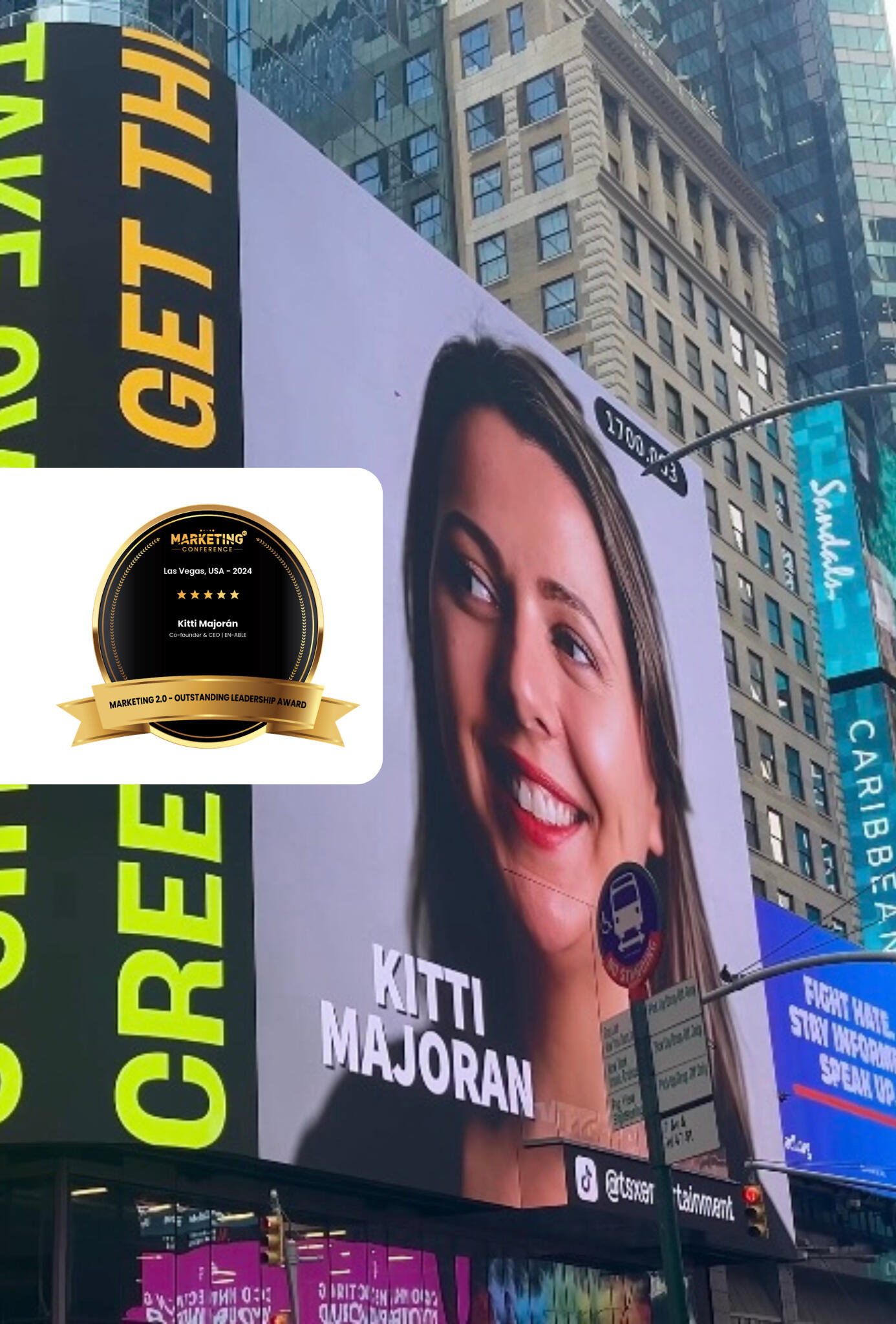 Electronic billboard with Kitti Majoran's portrait and name on Times Square (NYC) with the Marketing 2.0 award sleeve inserted on the left of the picture.
